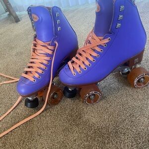 Purple Roller Skates with Orange Laces